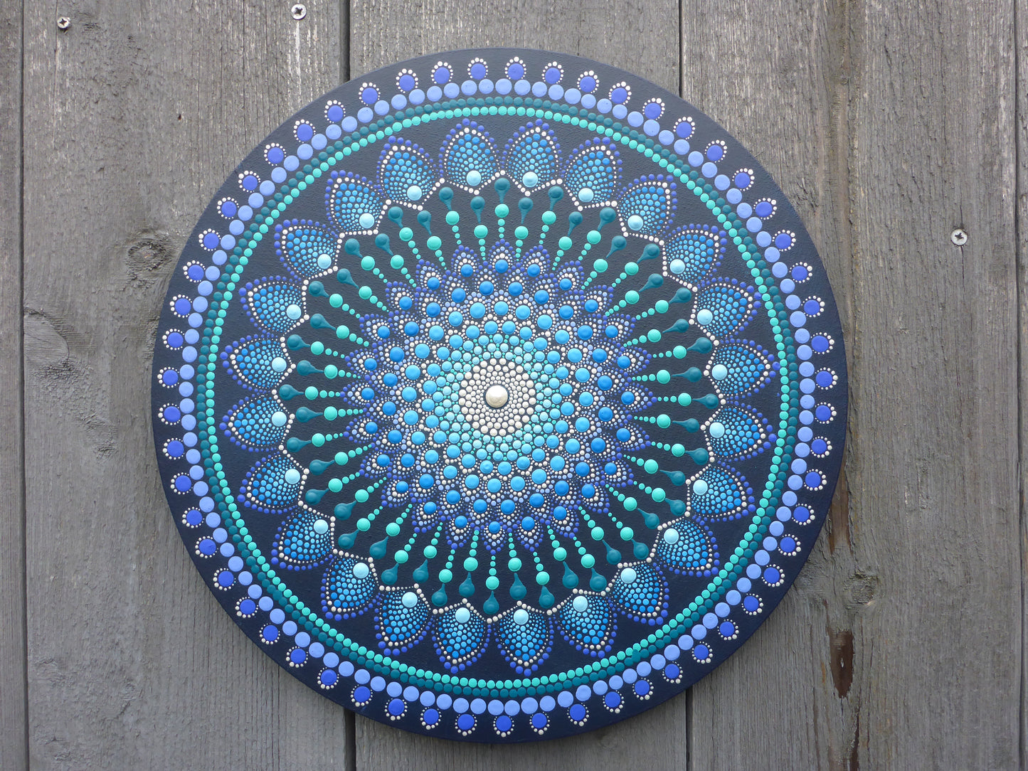 Handgemaakte mandala in blauwtinten